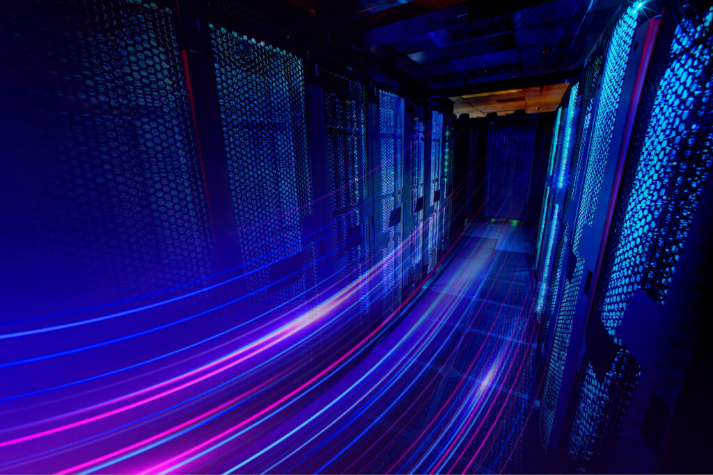 Data centre corridor with streaks of light, representing event-driven architecture