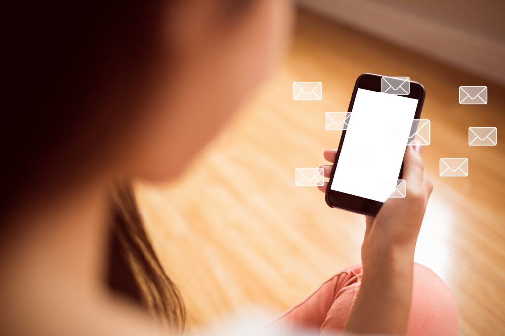 Woman surrounded by notification icons, showing how UX can affect mental wellbeing
